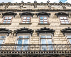 Facade of an old architectural building, classical architecture.